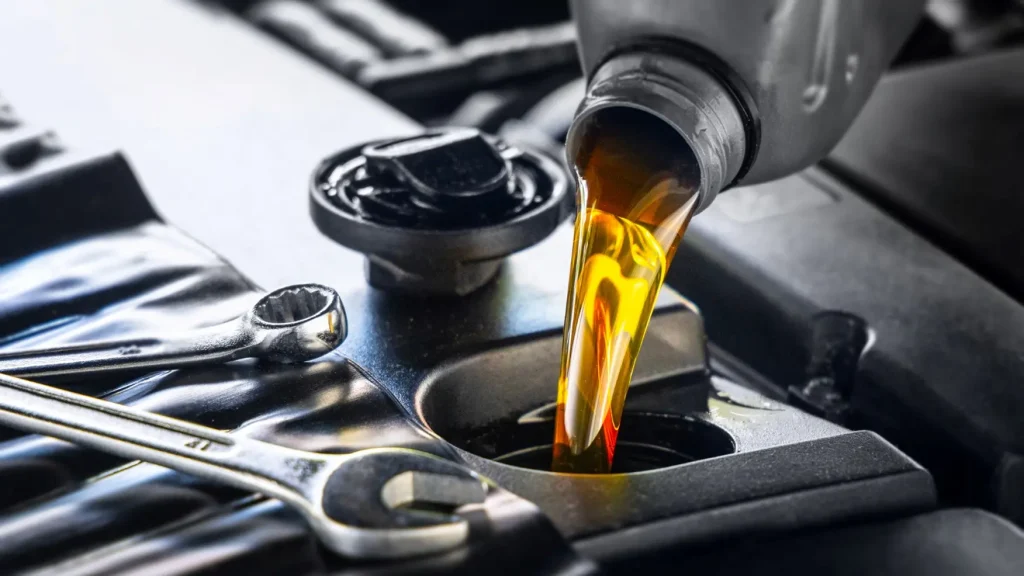 gettyimages adding engine oil Qualified Car repair service center H&B Auto Repair